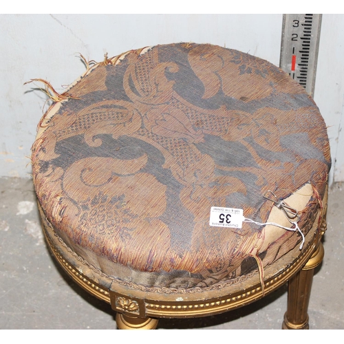 35 - A vintage giltwood stool with carved details