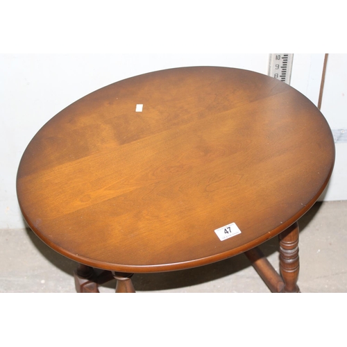 47 - Small oval side or lamp table