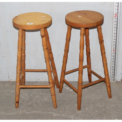 50 - A pair of pine kitchen stools