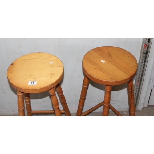 50 - A pair of pine kitchen stools