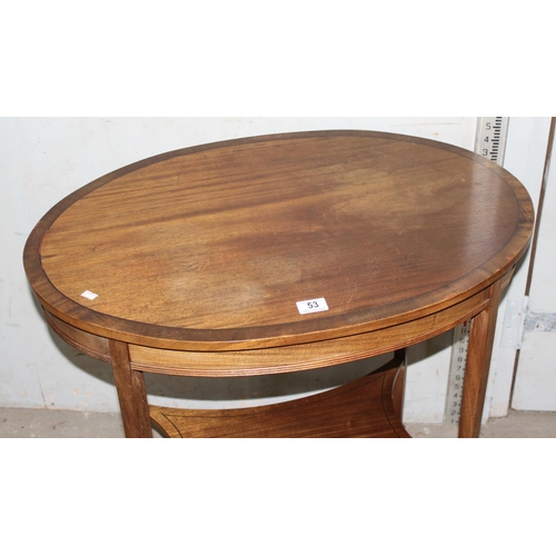 53 - An Edwardian oval mahogany side table