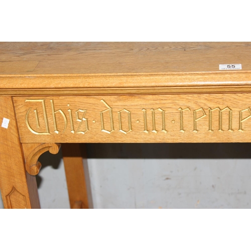 55 - A vintage light oak side table with gilt gothic script and carved Templar cross to base, likely from... 