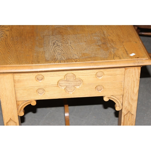 55 - A vintage light oak side table with gilt gothic script and carved Templar cross to base, likely from... 