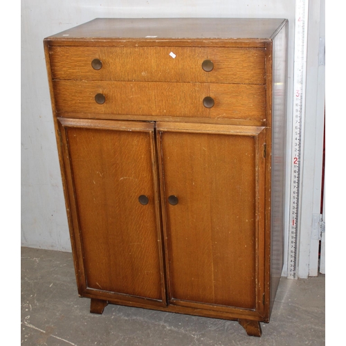 57 - A vintage small oak 2 drawer cupboard