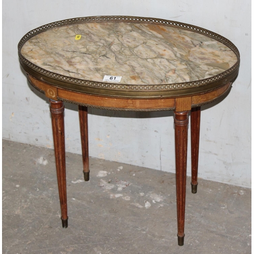 61 - A French Bouillotte table with marble top and brass gallery standing on fluted legs, likely 20th cen... 