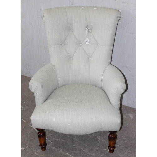 71 - A modern button back armchair with light grey upholstery