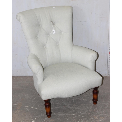 71 - A modern button back armchair with light grey upholstery