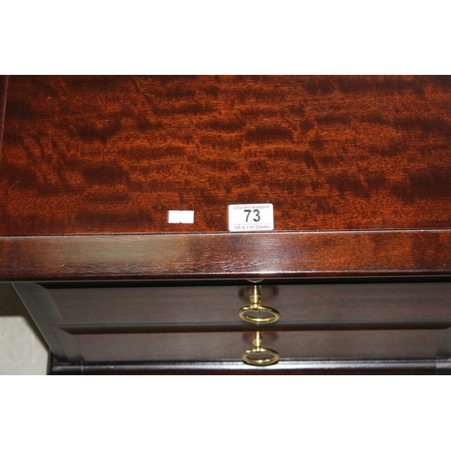 73 - A pair of Stag bedside cabinets