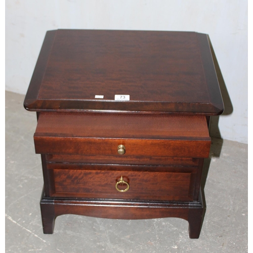 73 - A pair of Stag bedside cabinets