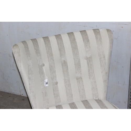 79 - A retro button back chair with striped upholstery