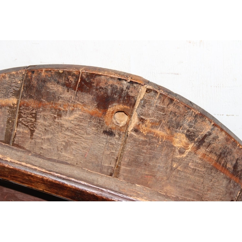 83 - An antique elm table with unusual folding base, believed to be 18th century or earlier