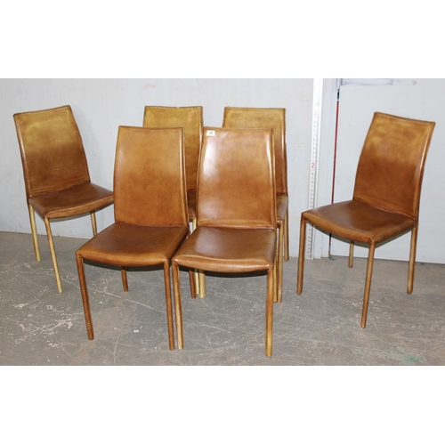 89 - A set of 6 tan leather clad dining chairs