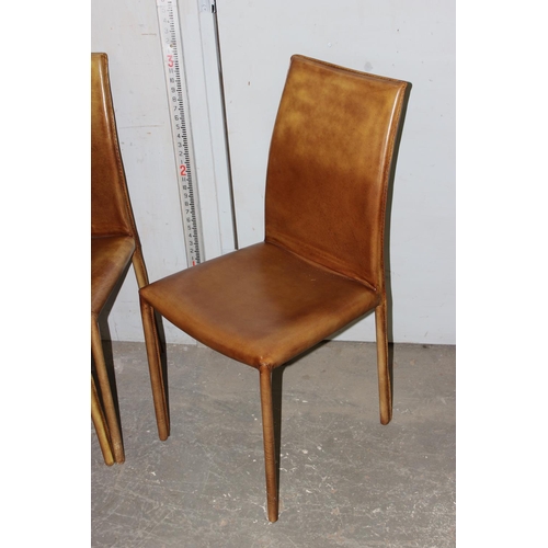 89 - A set of 6 tan leather clad dining chairs