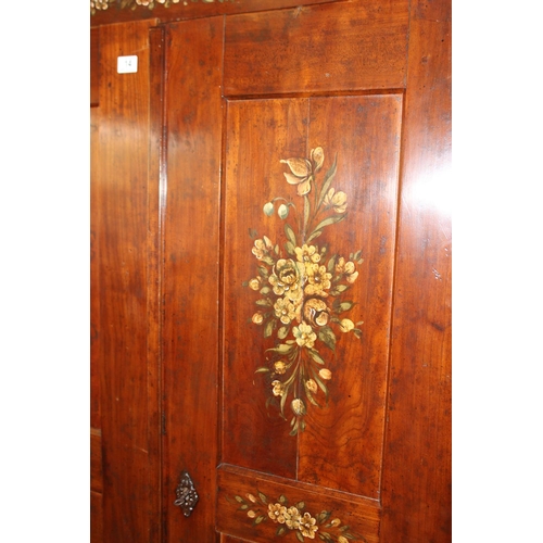 14 - An antique armoire or wardrobe hand painted with floral sprays, believed to be French late 19th cent... 