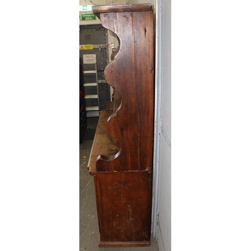 15 - A large antique pine kitchen dresser of unusual form, likely 19th century, approx 155cm wide x 180cm... 