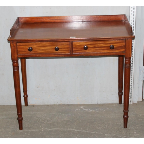 19 - A small antique mahogany desk with 2 drawers, approx 92cm wide