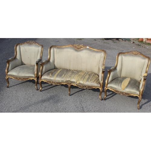 29 - A 19th century style carved giltwood salon set comprising a love seat and 2 chairs