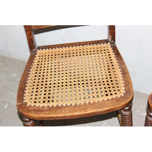 30 - A pair of unusual cane seated bedroom chairs with brass mounts and scumbled painted finish