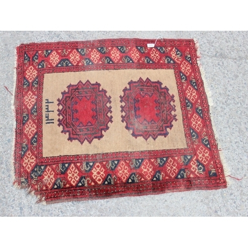 228 - A vintage signed Persian rug of red and cream ground, approx 100cm x 90cm