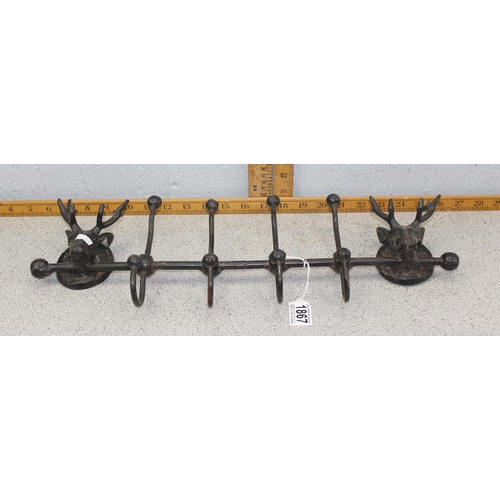 1867 - Cast iron deer designed coat hook