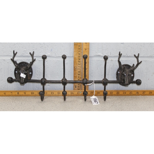 1867 - Cast iron deer designed coat hook