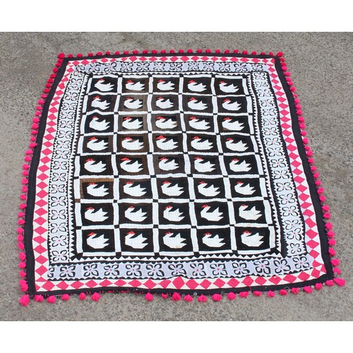 229G - An interesting vintage patchwork quilt decorated with swans and metal discs, approx 210cm x 145cm