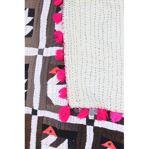 229G - An interesting vintage patchwork quilt decorated with swans and metal discs, approx 210cm x 145cm