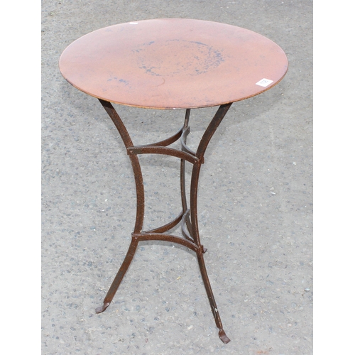 106 - An unusual vintage wrought metal and enamel topped table