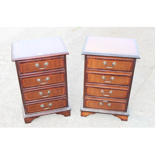 149 - A pair of 20th century 4 drawer mahogany effect bedside cabinets