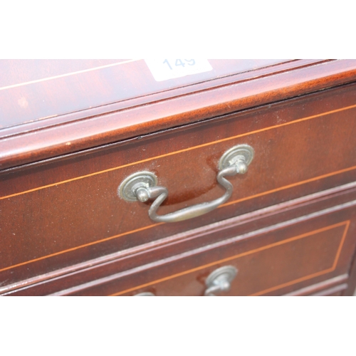 149 - A pair of 20th century 4 drawer mahogany effect bedside cabinets