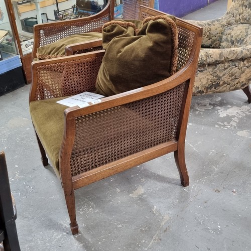 177 - A pair of Edwardian Regency revival style Bergere armchairs with cushions