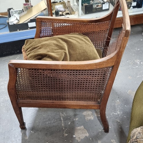 177 - A pair of Edwardian Regency revival style Bergere armchairs with cushions