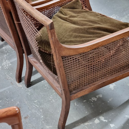 177 - A pair of Edwardian Regency revival style Bergere armchairs with cushions