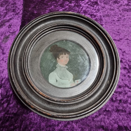 473 - 2 antique painting on glass miniatures in ebonised circular frames, various annotations verso