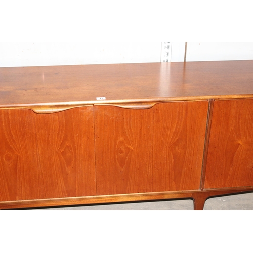 11 - A mid-century McIntosh retro sideboard with 3 drawers and 3 doors, approx 201cm wide