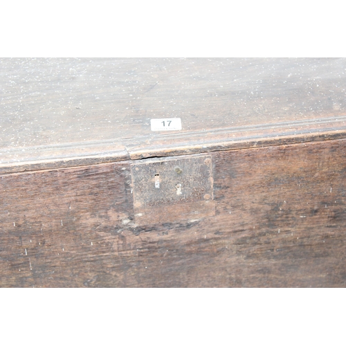 17 - An antique small Elm coffer with carved details, likely 18th century, approx 95cm wide