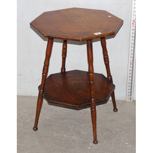 19 - A small early 20th century octagonal oak table with turned legs, approx 54cm wide