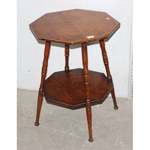 19 - A small early 20th century octagonal oak table with turned legs, approx 54cm wide