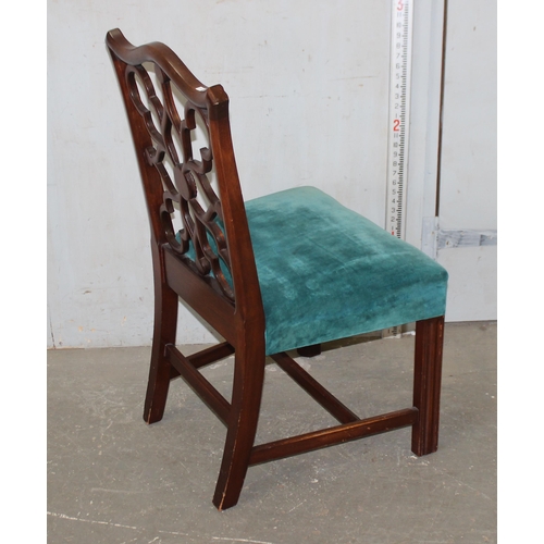 2 - A Georgian mahogany chair with unusual symmetrical designed back and stuffed seat