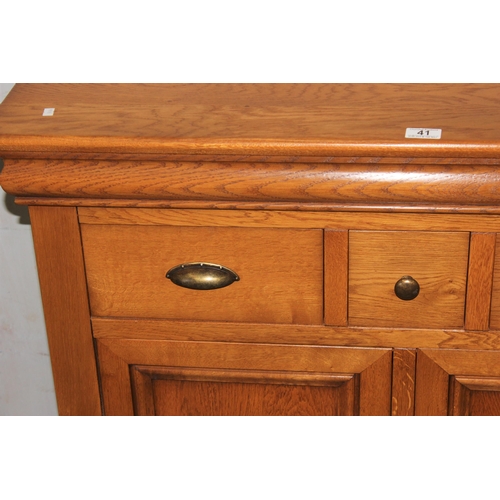 41 - Modern light oak sideboard with 3 drawers above 2 cupboards