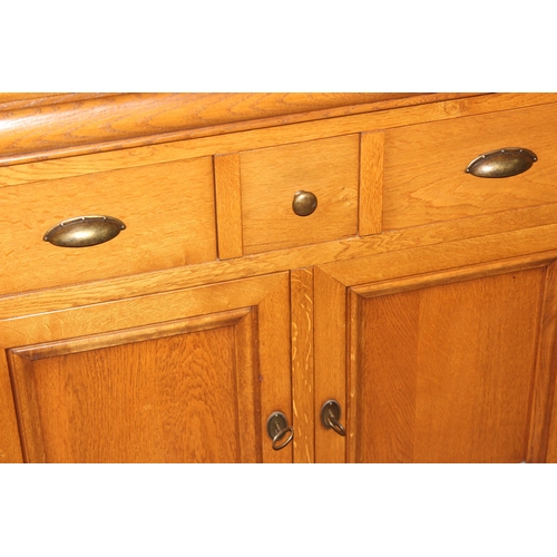 41 - Modern light oak sideboard with 3 drawers above 2 cupboards