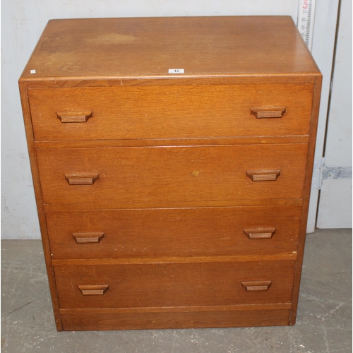 42 - A retro E. Gomme (later G-Plan) mid-century oak 4 drawer chest of drawers, approx. 100cm wide