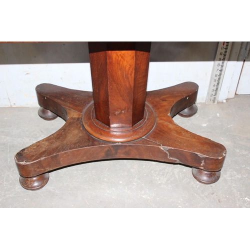 51 - 19th century mahogany fold over tea table on a pedestal base, approx 100cm wide