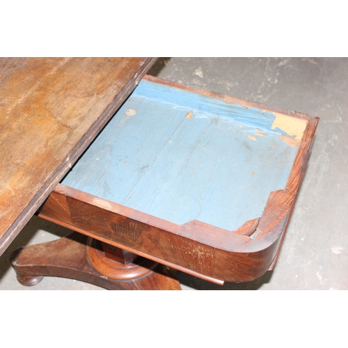 51 - 19th century mahogany fold over tea table on a pedestal base, approx 100cm wide