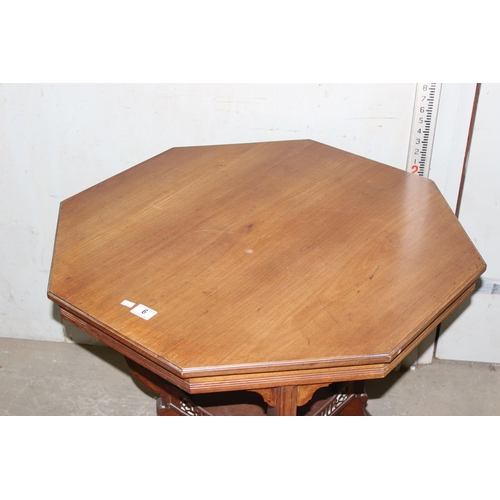 6 - An antique mahogany octagonal topped table with fretwork base depicting Art Deco motifs, approx 75cm... 