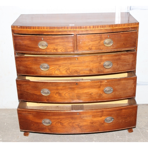 60 - Antique bow front 2 over 3 chest of draws with brass drop handles.