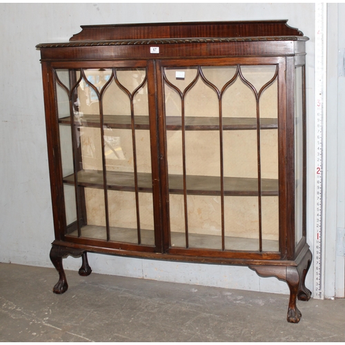 67 - An early 20th century glazed display cabinet