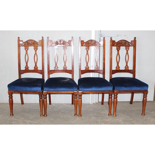 72 - A set of 4 late 19th century chairs with Art Nouveau style carving and stuffed seats