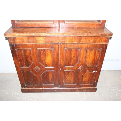 82 - A large 19th century mahogany bookcase with astral glazed top