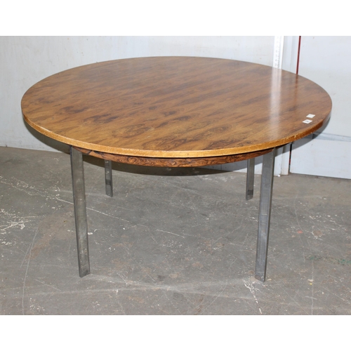 84 - A retro rosewood effect circular dining table with chrome legs, likely Danish but unmarked, approx 1... 